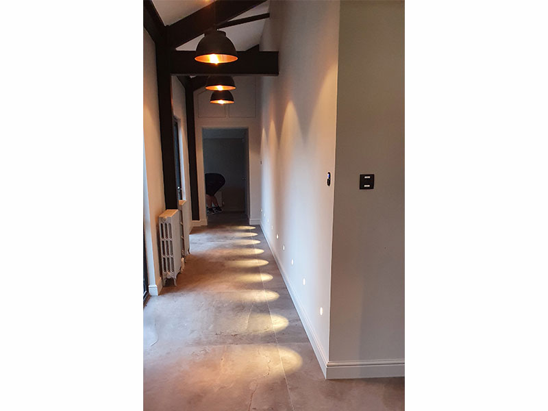 corridor with designer lighting